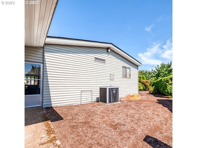 1199 North Terry Street Eugene, OR 97402 - Photo 24 of 32 a view of a house with a backyard