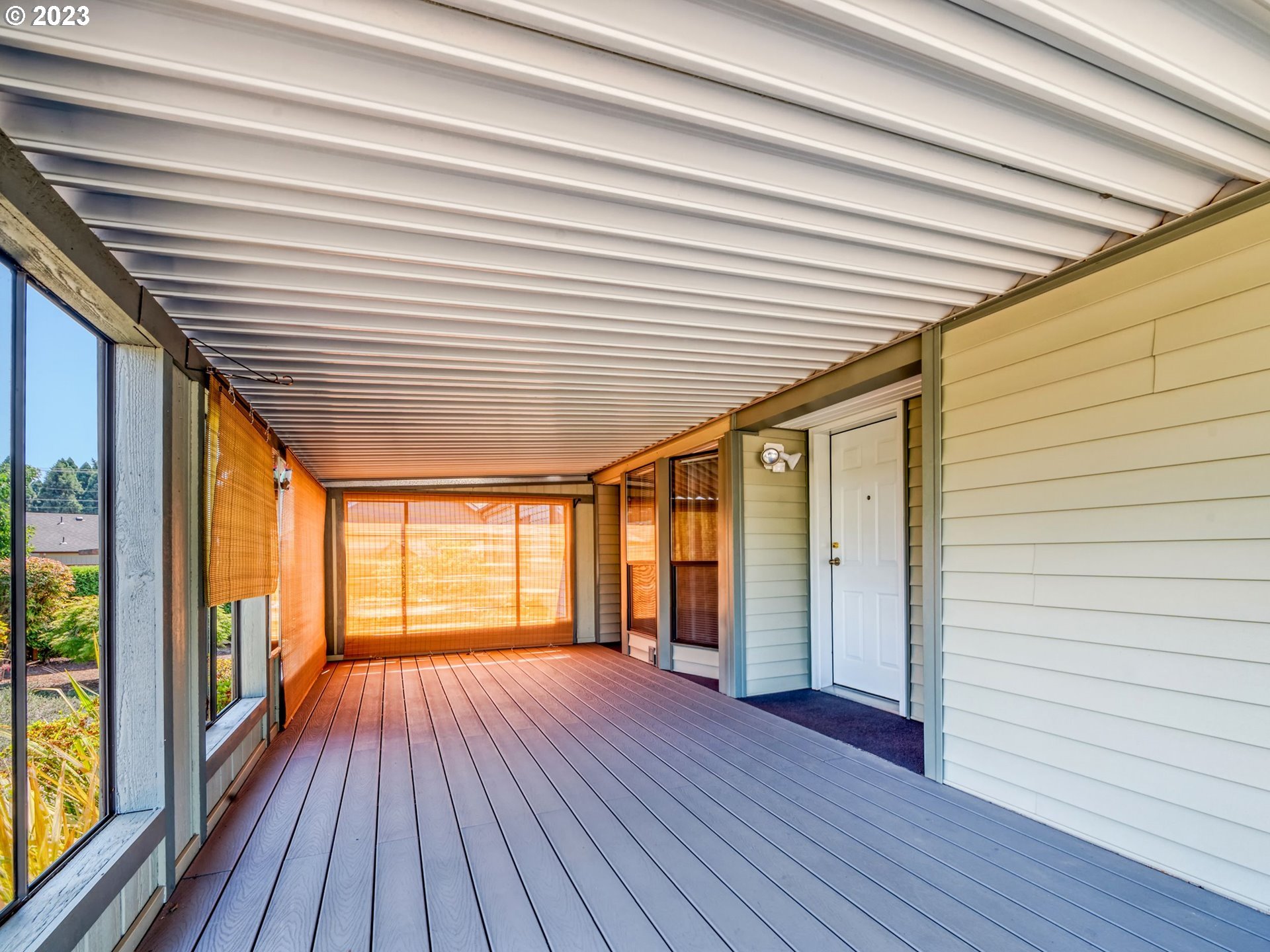1199 North Terry Street Eugene, OR 97402 - Photo 5 of 32 a view of outdoor space with wooden floor and windows