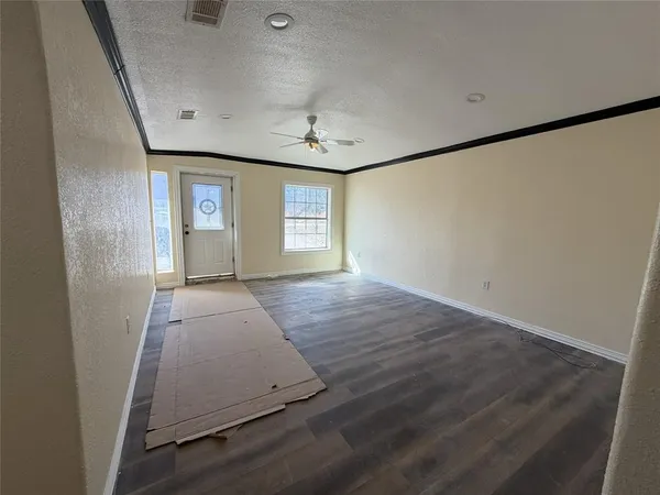 an empty room with windows