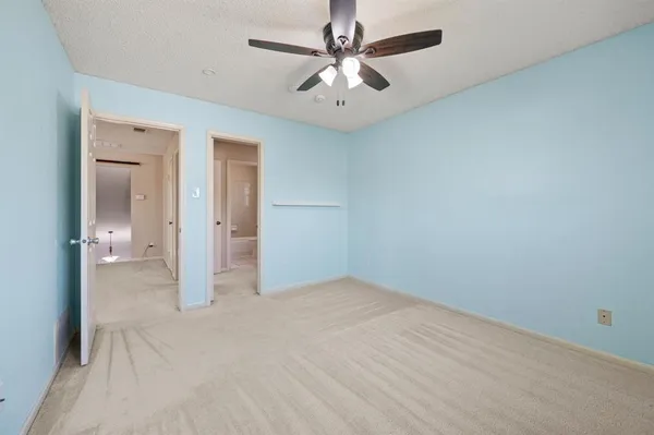 a picture of a bathroom with a shower