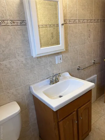a bathroom with a sink and a toilet