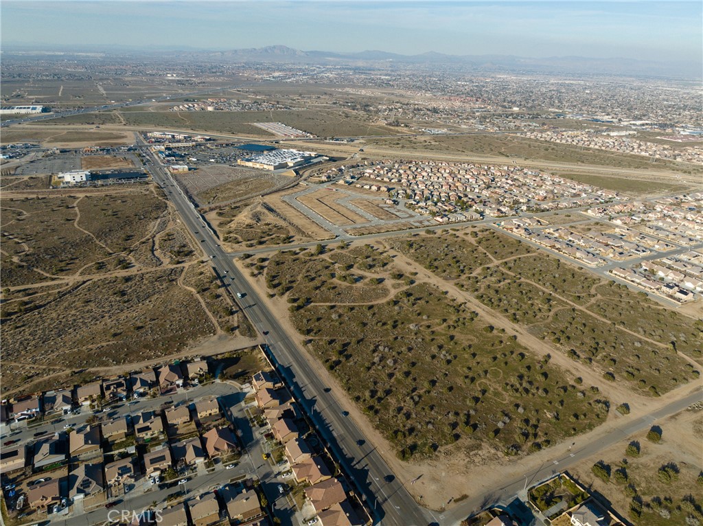 0 Escondido Avenue Hesperia, CA 92344 - Photo 4 of 58 an aerial view of beach and city