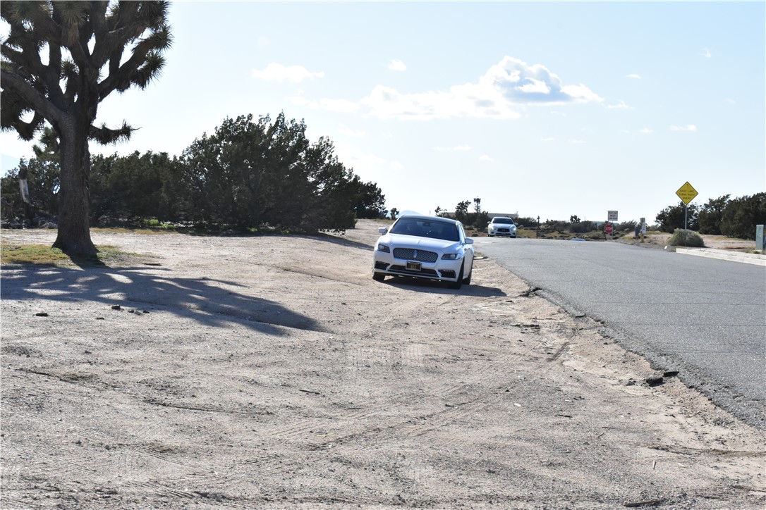 0 Escondido Avenue Hesperia, CA 92344 - Photo 55 of 58 a car parked on the side of the road