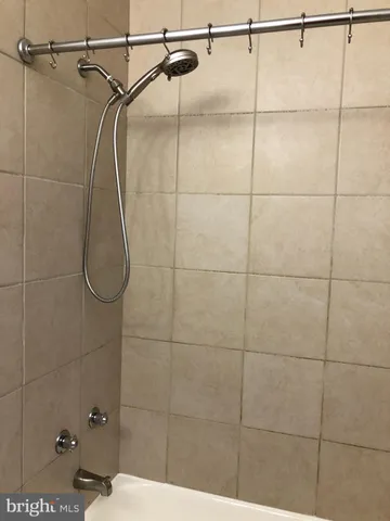 a bathroom that has a shower in a bathroom