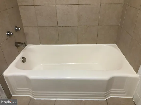 a bathroom with a bathtub