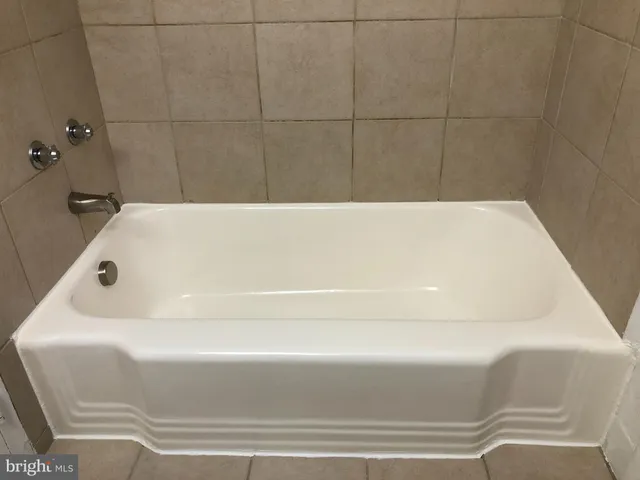 a bathroom with a bathtub