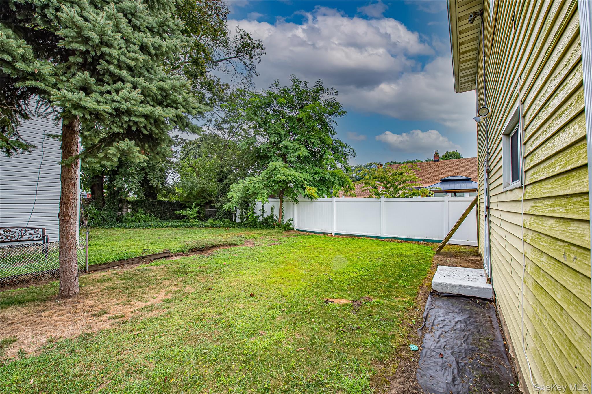 15 Major Road Massapequa, NY 11758 - Photo 22 of 25 a view of a back yard
