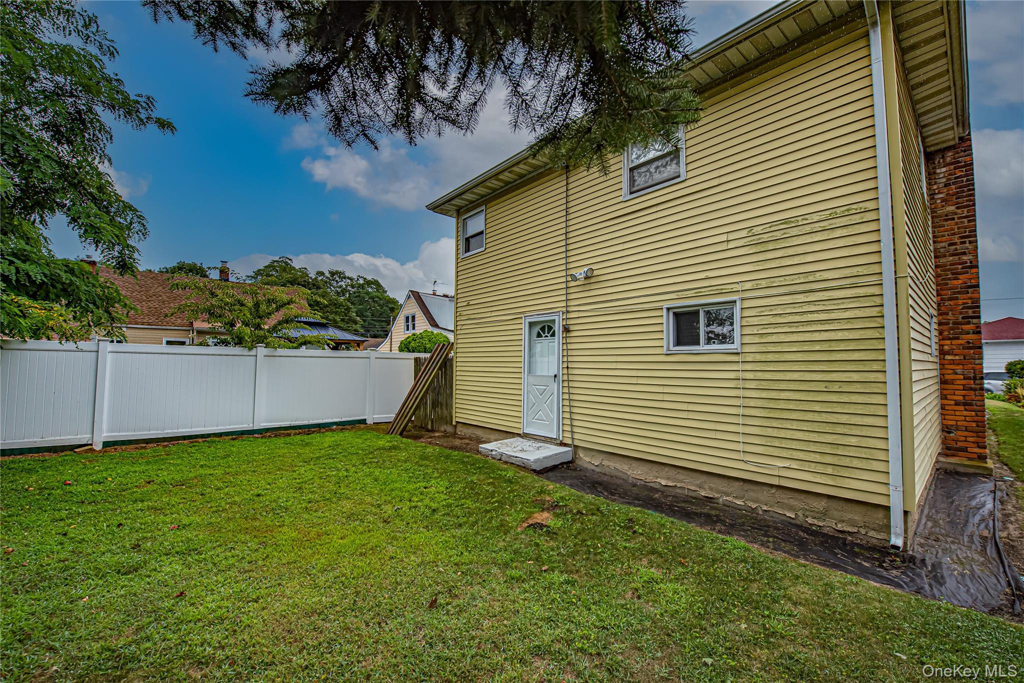 15 Major Road Massapequa, NY 11758 - Photo 23 of 25 a view of a backyard with a garden