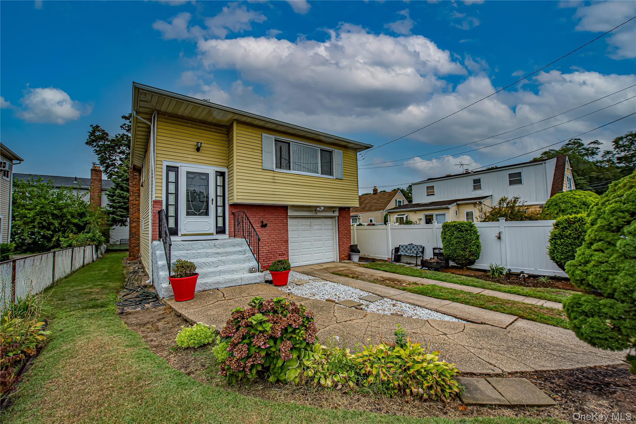 15 Major Road Massapequa, NY 11758 - Photo 25 of 25 a front view of a house with a yard
