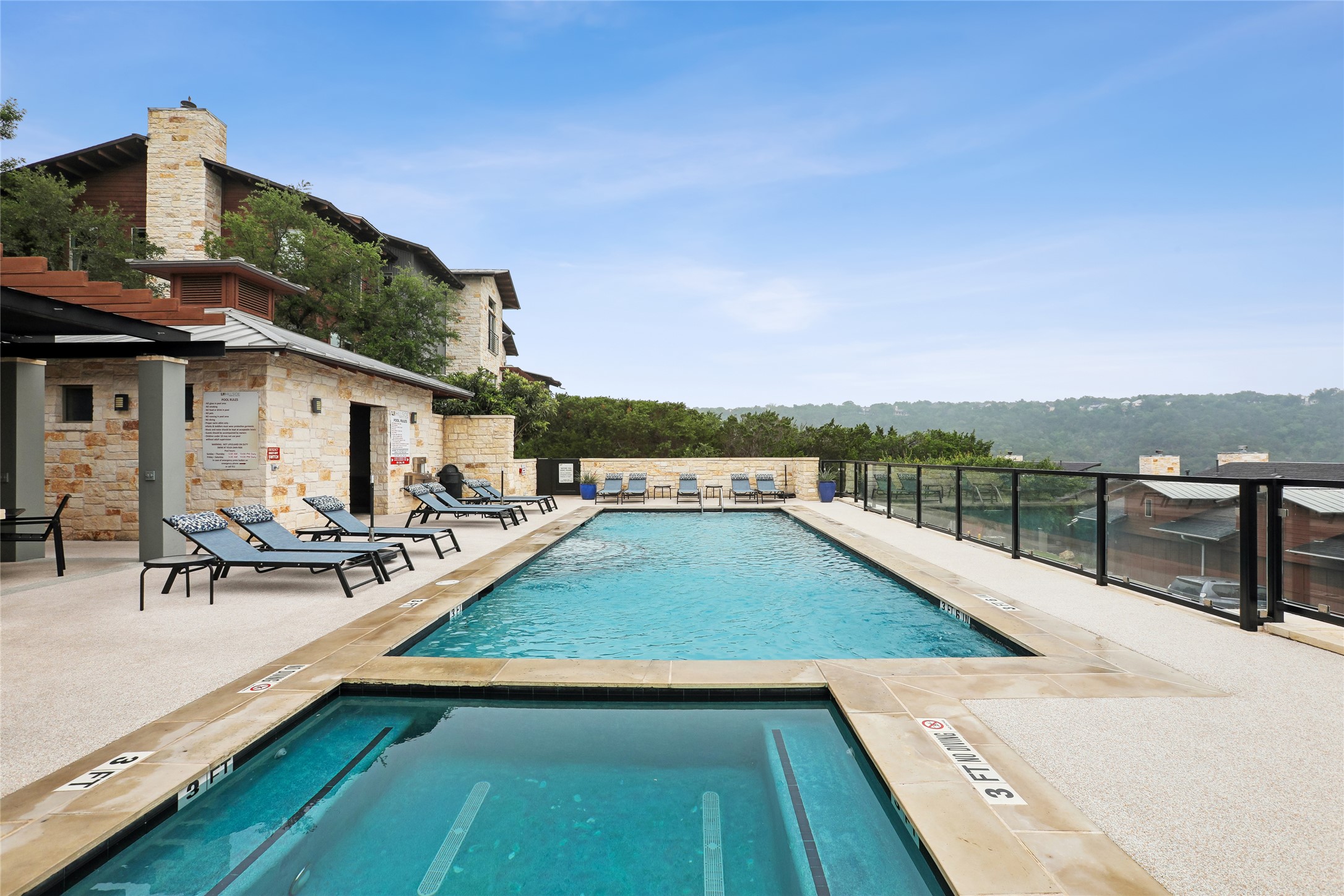 8110 Ranch Road 2222, Unit 10 Austin, TX 78730 - Photo 20 of 23 a view of a patio with chairs and a table