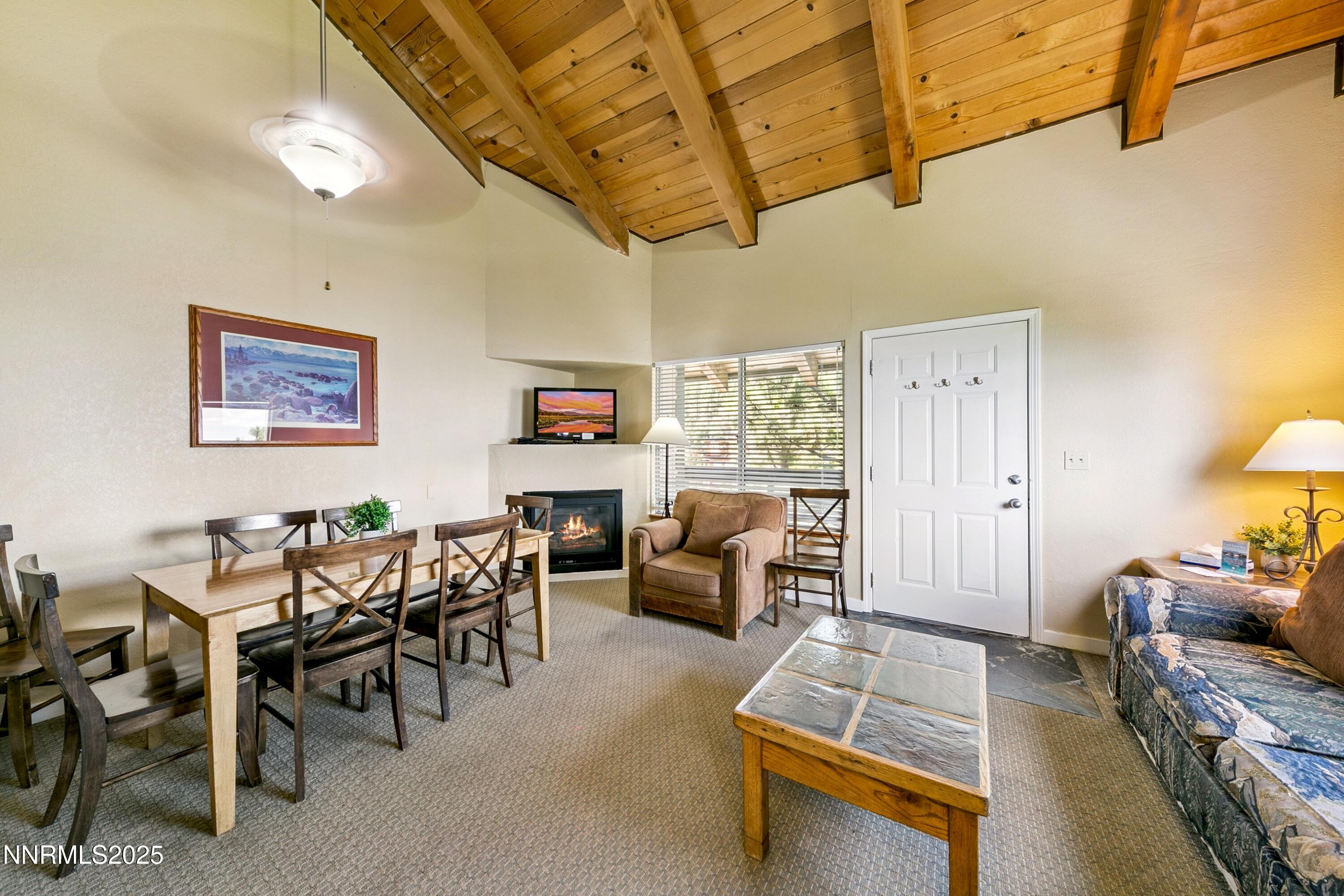 305 Galaxy Lane, Unit 7 Stateline, NV 89449 - Photo 16 of 61 a living room with furniture and a wooden floor
