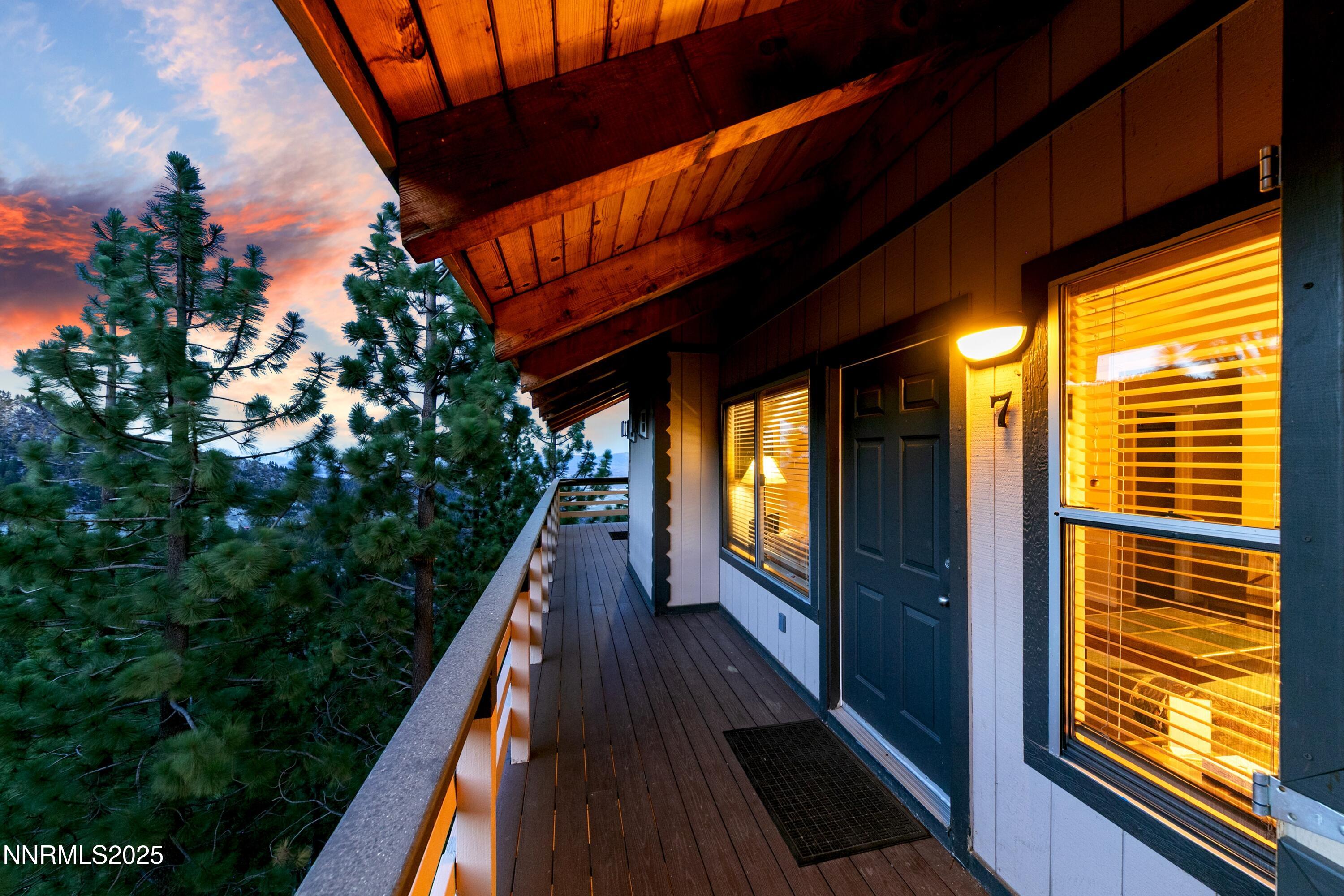 305 Galaxy Lane, Unit 7 Stateline, NV 89449 - Photo 46 of 61 a view of balcony with wooden floor and outdoor space