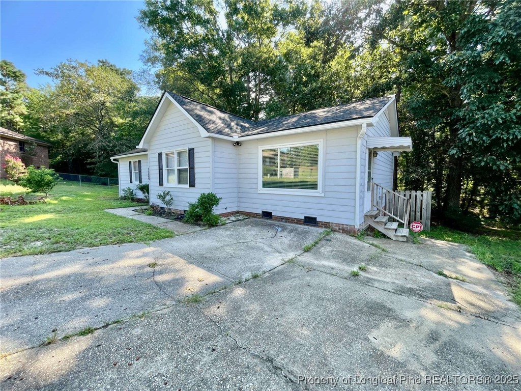 1505 Diamond Road Fayetteville, NC 28311 - Photo 2 of 21 a view of a house with a yard
