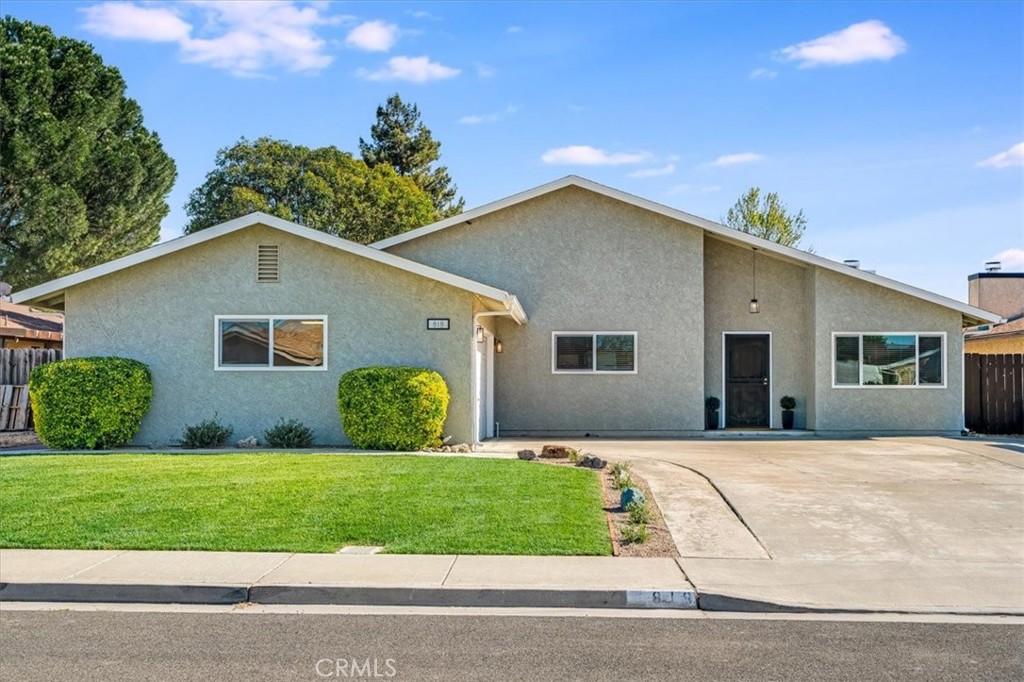 818 Wade Drive Paso Robles, CA 93446 - Photo 1 of 1 a front view of house with yard and green space