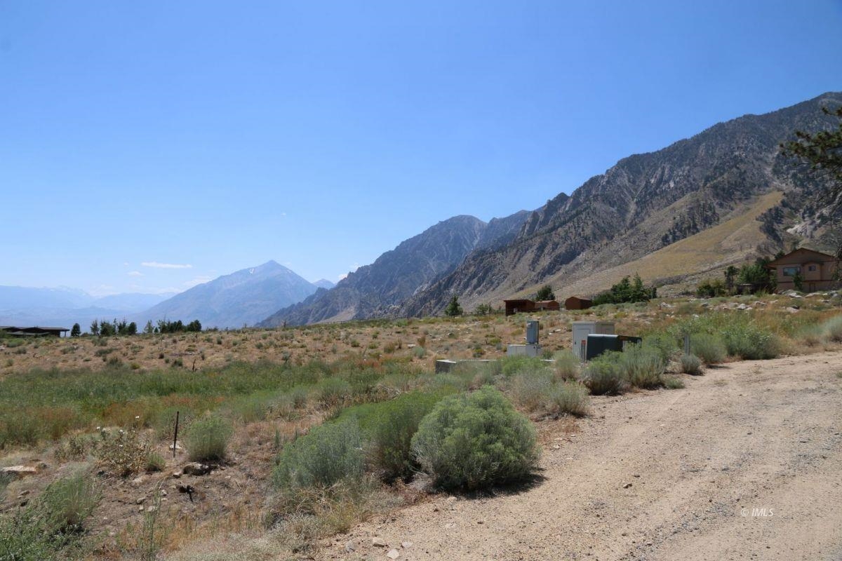 31 Wilson Road, Unit 8 Bishop, CA 93514 - Photo 2 of 3 a view of a lake with mountains in the background