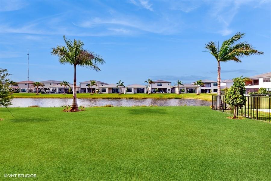 8350 Royal County Down Road Boca Raton, FL 33434 - Photo 36 of 52 a view of a big yard with a table and chairs