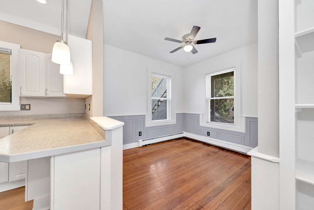 24 Taylor Street, Unit 1 Gloucester, MA 01930 - Photo 16 of 29 a view of a kitchen with a sink dishwasher and a window