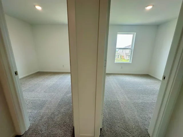 an empty room with windows