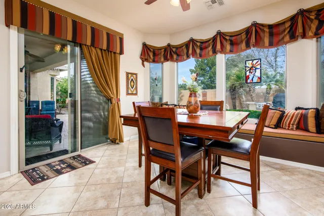 a bathroom with a sink toilet vanity tub and shower