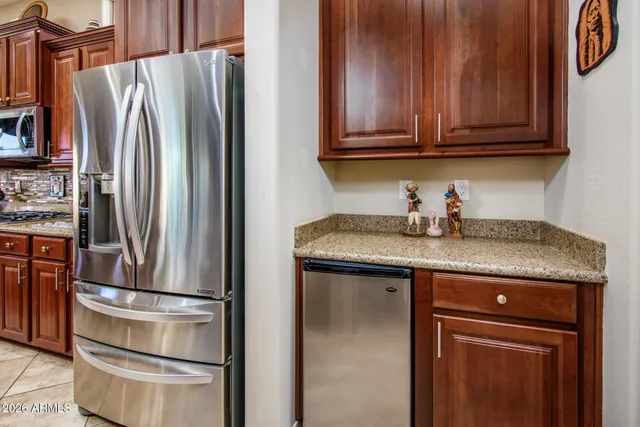 a view of a storage & utility room with empty racks