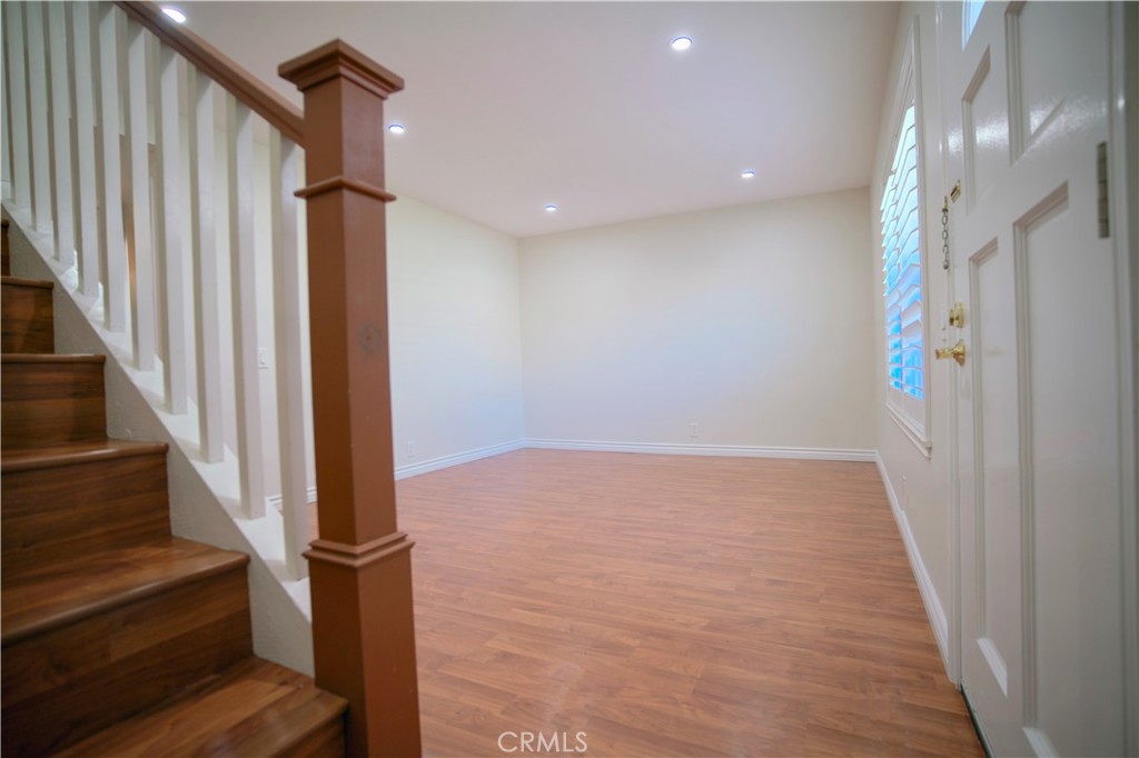 10 Raleigh Irvine, CA 92604 - Photo 14 of 28 a view of an entryway with wooden floor