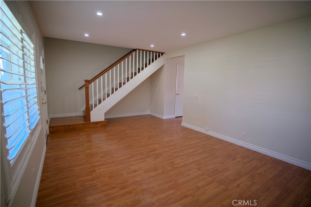 10 Raleigh Irvine, CA 92604 - Photo 3 of 28 a view of entryway and hall with wooden floor