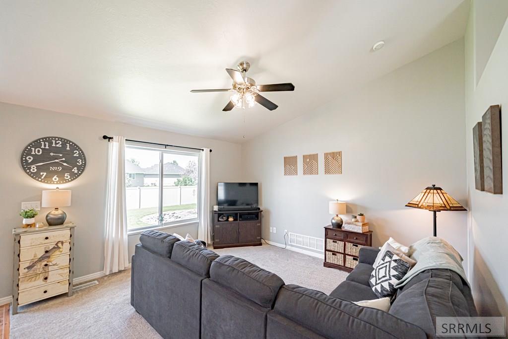 3947 Jordan Circle Ammon, ID 83406 - Photo 15 of 81 Main Floor Family Room