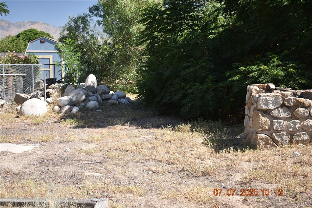 28986 Merris Street Highland, CA 92346 - Photo 3 of 6 a view of backyard of the house