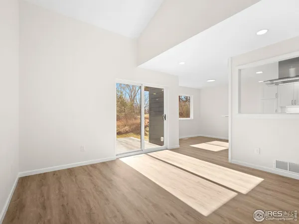 a view of an empty room and window