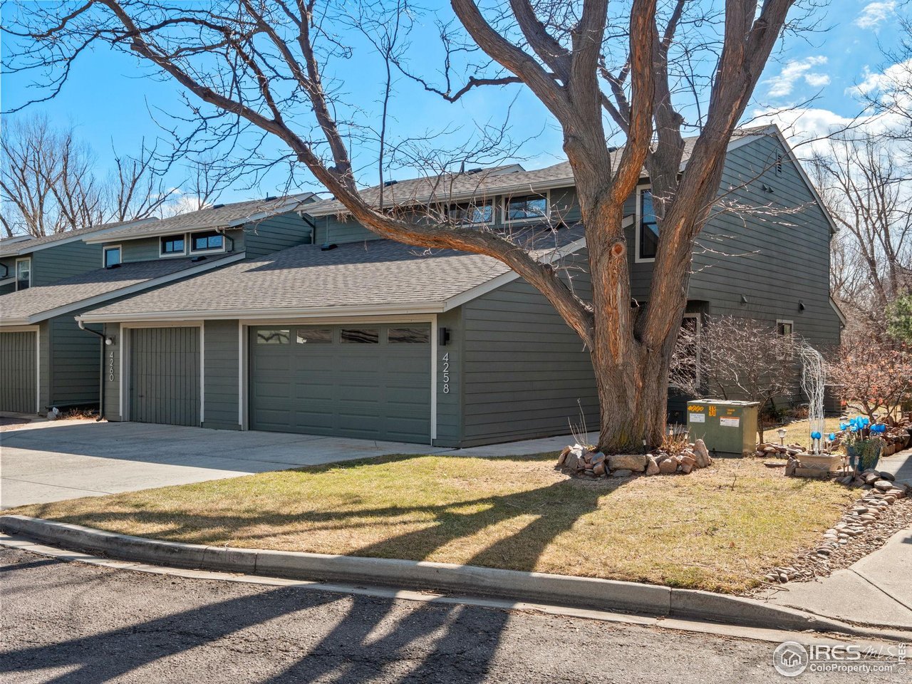 4258 Corriente Place Boulder, CO 80301 - Photo 2 of 37 a view of a house with snow on the road