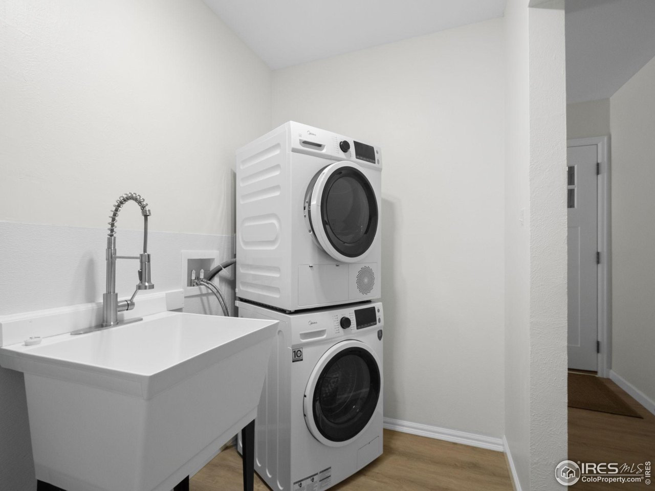 4258 Corriente Place Boulder, CO 80301 - Photo 23 of 37 a utility room with dryer and washer