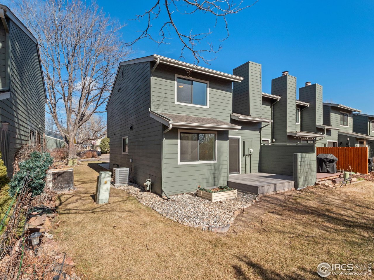 4258 Corriente Place Boulder, CO 80301 - Photo 27 of 37 a front view of a house with a yard