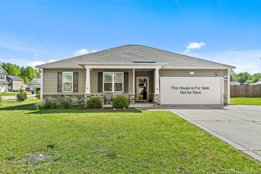 113 Meherrin Loop Raeford, NC 28376 - Photo 2 of 27 a view of a house with a yard