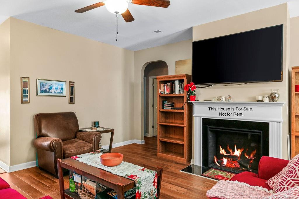 113 Meherrin Loop Raeford, NC 28376 - Photo 21 of 27 a living room with furniture and a fireplace