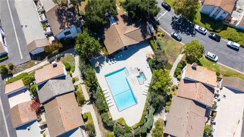 an aerial view of residential house with outdoor space