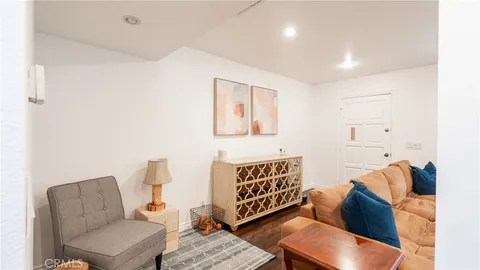 a living room with furniture and a couch