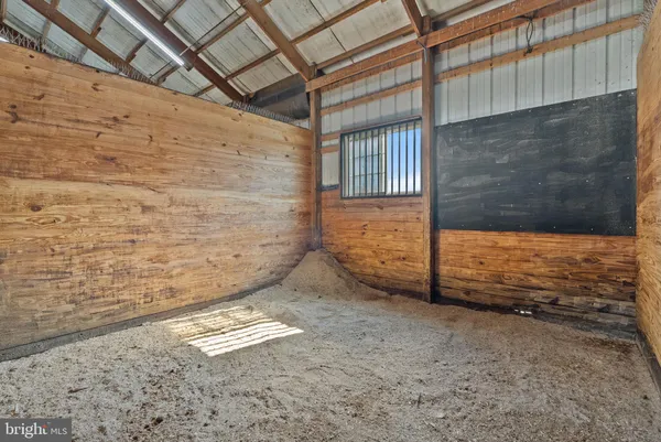 a view of an empty room with stairs