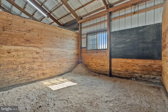 a view of an empty room with stairs