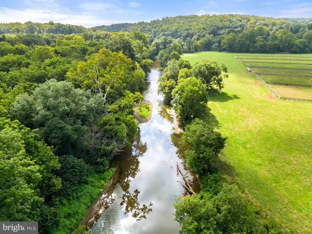 a view of a playground with basketball court