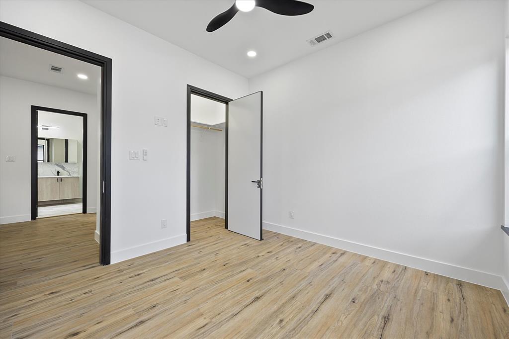 2811 Rodeo Drive Quinlan, TX 75474 - Photo 20 of 35 Unfurnished bedroom featuring light wood-style flooring, recessed lighting, a closet, and ceiling fan