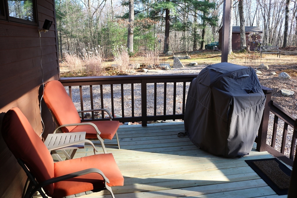 30 Southwick Road Sutton, MA 01590 - Photo 4 of 27 a view of balcony with couch and outdoor seating