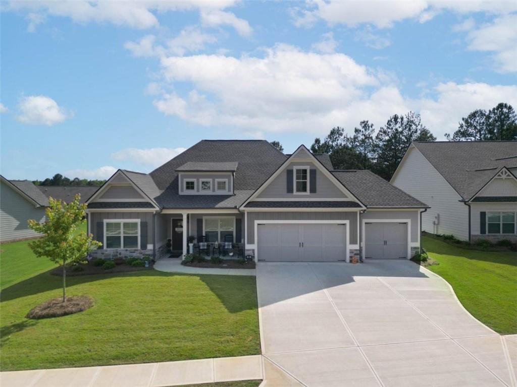 648 Haven Way Monroe, GA 30655 - Photo 1 of 1 front view of a house with a yard