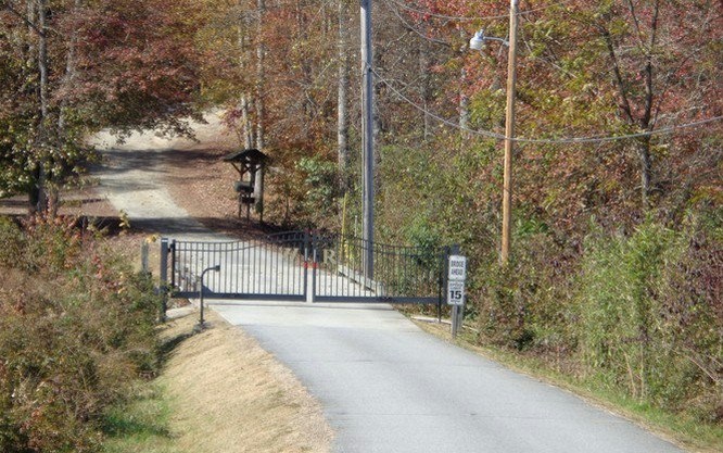 Lot 3 Willow Ridge Warne, NC 28909 - Photo 11 of 11 a view of a patio with a table and chairs and potted plants