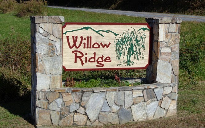 Lot 3 Willow Ridge Warne, NC 28909 - Photo 10 of 11 a sign on the side of building