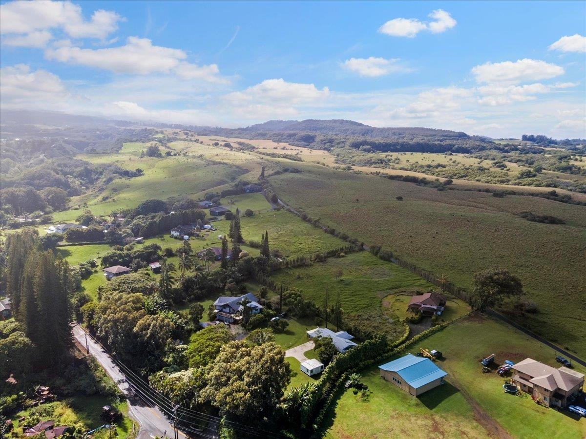 200 Awalau Road, Unit B Haiku, HI 96708 - Photo 16 of 39 a view of a lake with a mountain