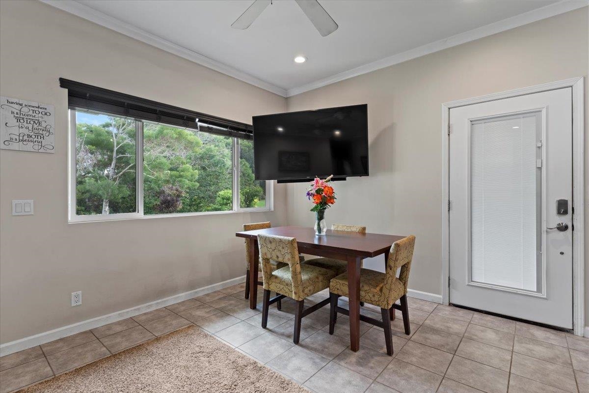 200 Awalau Road, Unit B Haiku, HI 96708 - Photo 17 of 39 a view of a dining room with furniture window and outside view