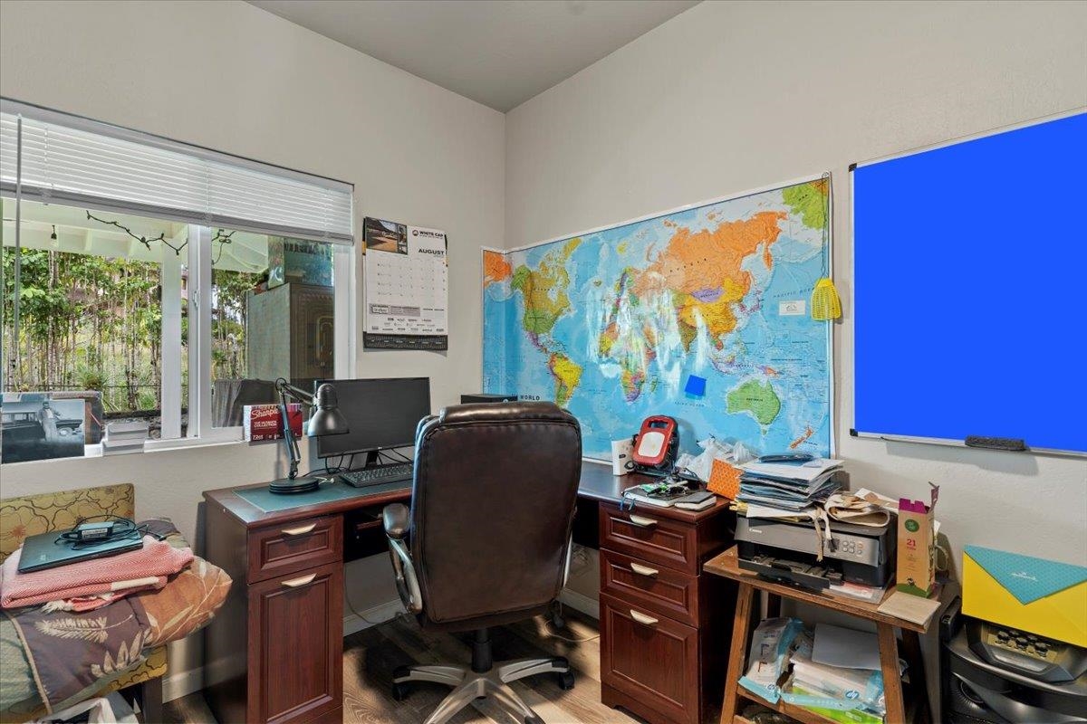 200 Awalau Road, Unit B Haiku, HI 96708 - Photo 37 of 39 a room with furniture and a window