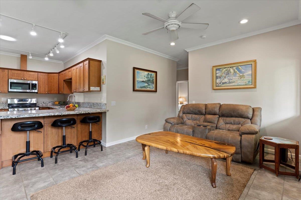 200 Awalau Road, Unit B Haiku, HI 96708 - Photo 4 of 39 a living room with furniture kitchen view and a window