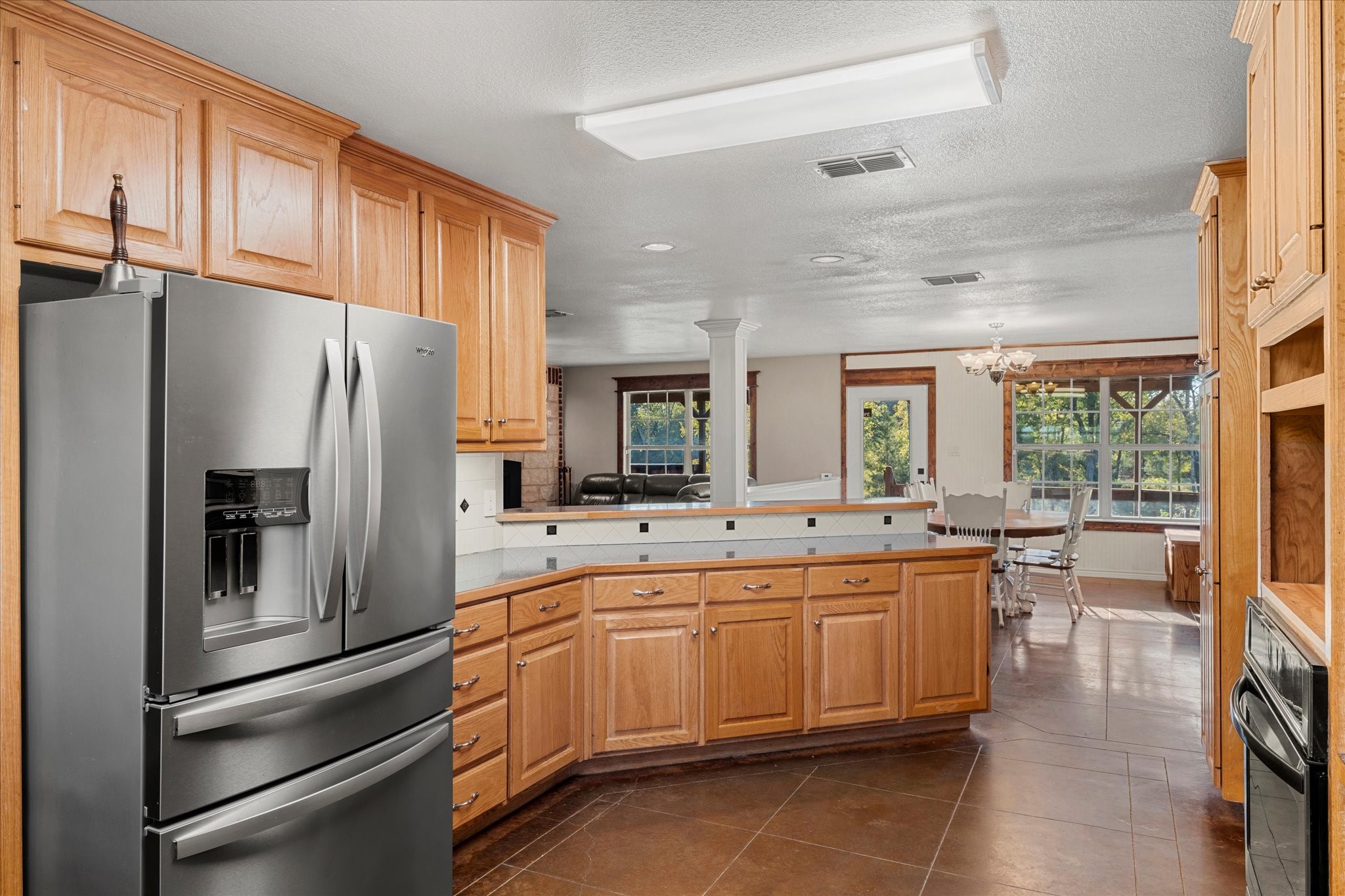 3115 Rains County Road 2610 Alba, TX 75410 - Photo 11 of 49 a large kitchen with a large window and stainless steel appliances