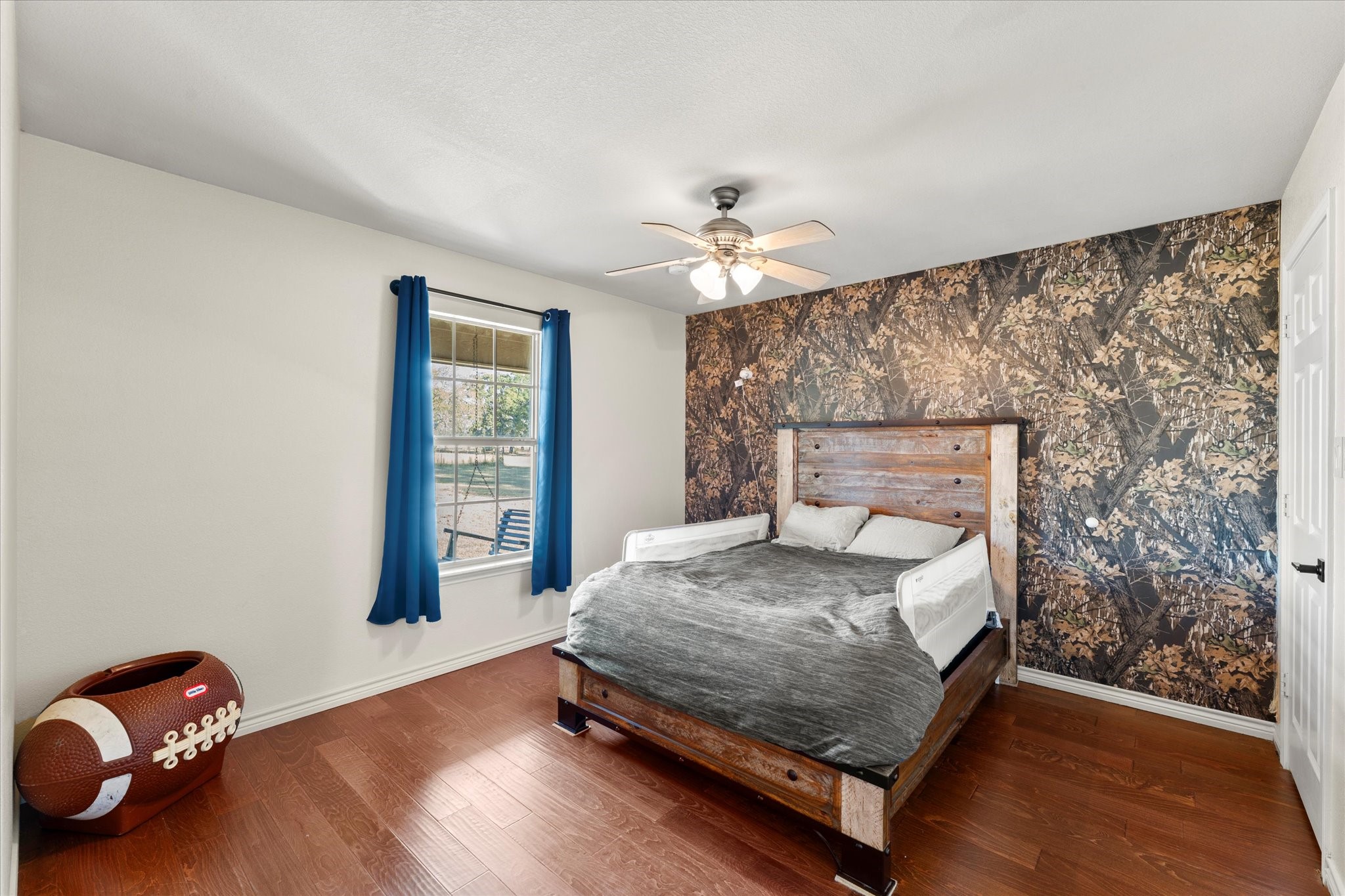 3115 Rains County Road 2610 Alba, TX 75410 - Photo 19 of 49 a bedroom with a bed and window